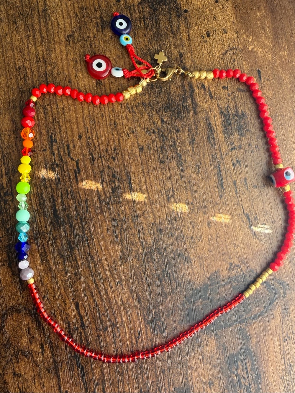 Red Beaded Rainbow Accent Necklace  with Evil Eye Charms
